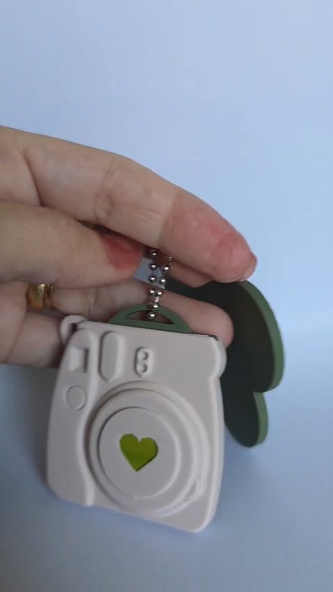 Polaroid-style keychain + name video thumbnail